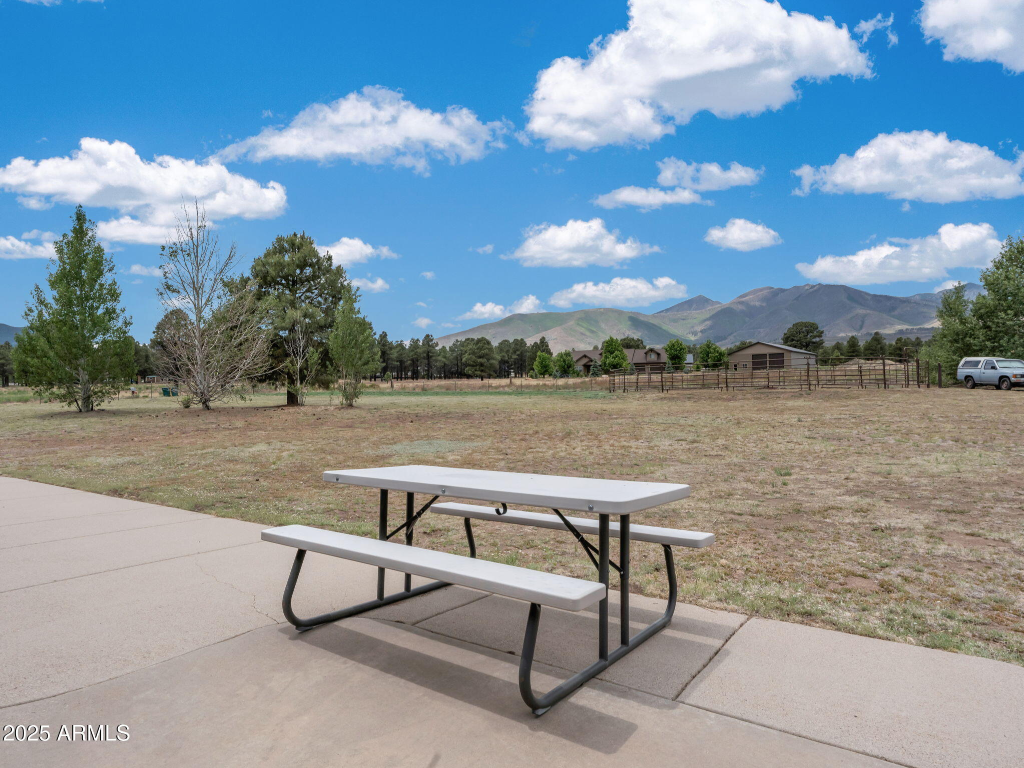 5545 East Atkinson Road Flagstaff, AZ 86004 - Photo 34 of 55 a view of a lake with outdoor seating