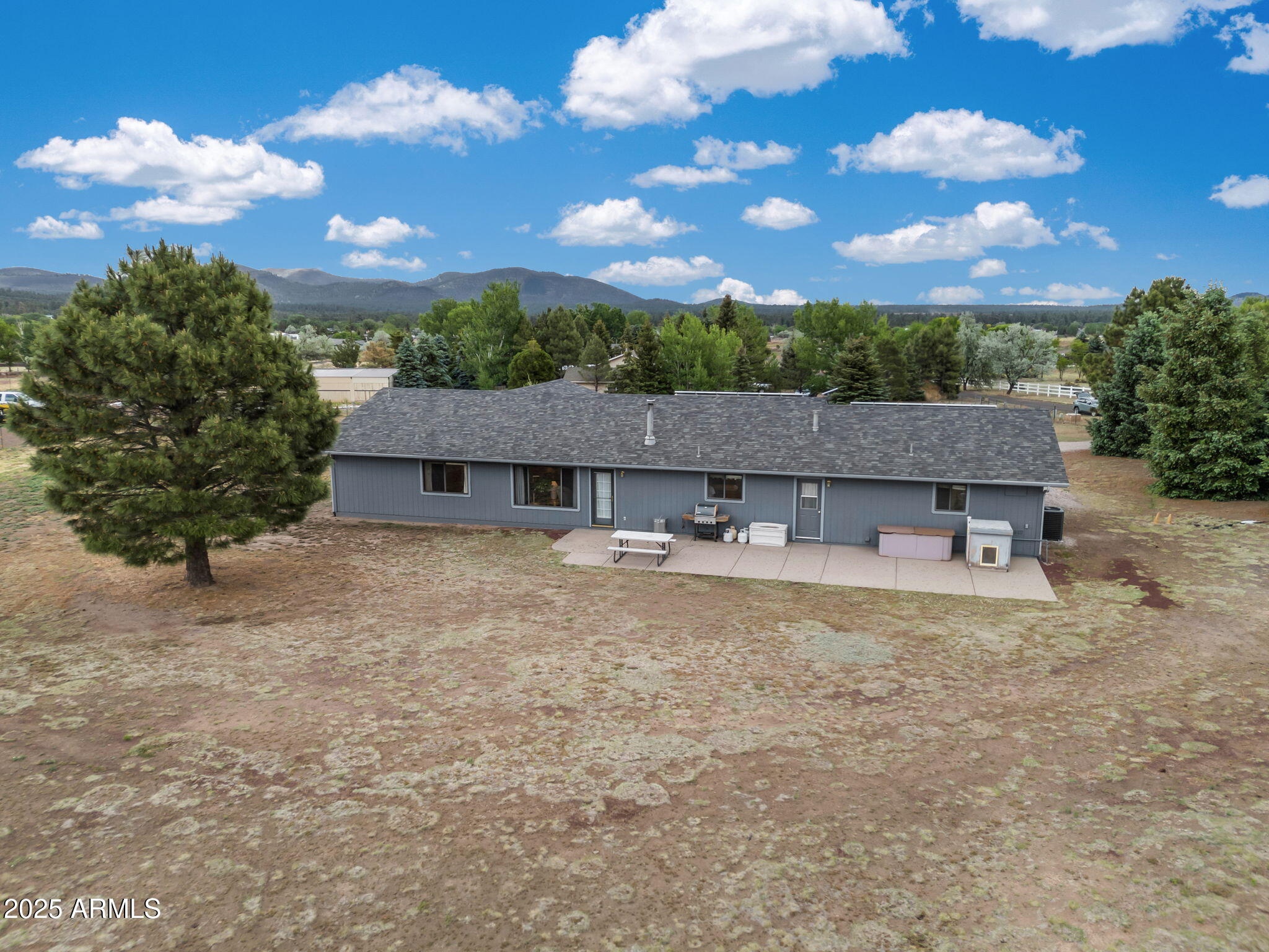 5545 East Atkinson Road Flagstaff, AZ 86004 - Photo 38 of 55 front view of a house with a yard