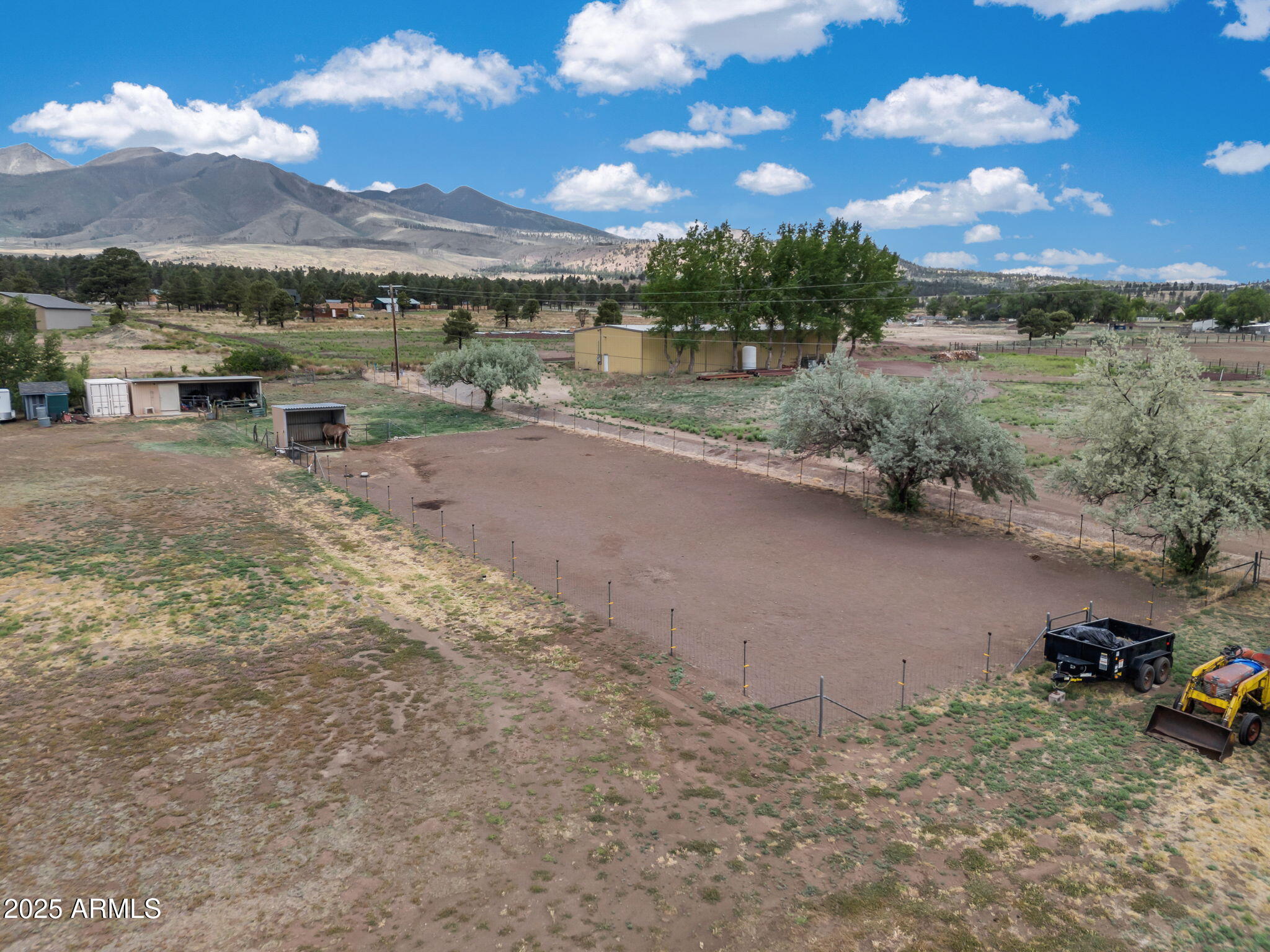 5545 East Atkinson Road Flagstaff, AZ 86004 - Photo 45 of 55 a view of a lake with houses in the back