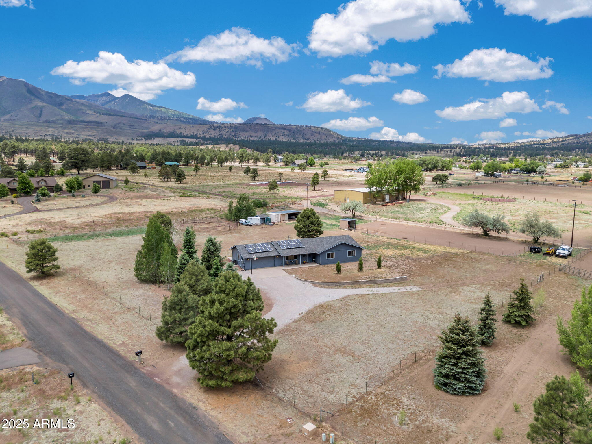 5545 East Atkinson Road Flagstaff, AZ 86004 - Photo 47 of 55 a view of a lake with a yard