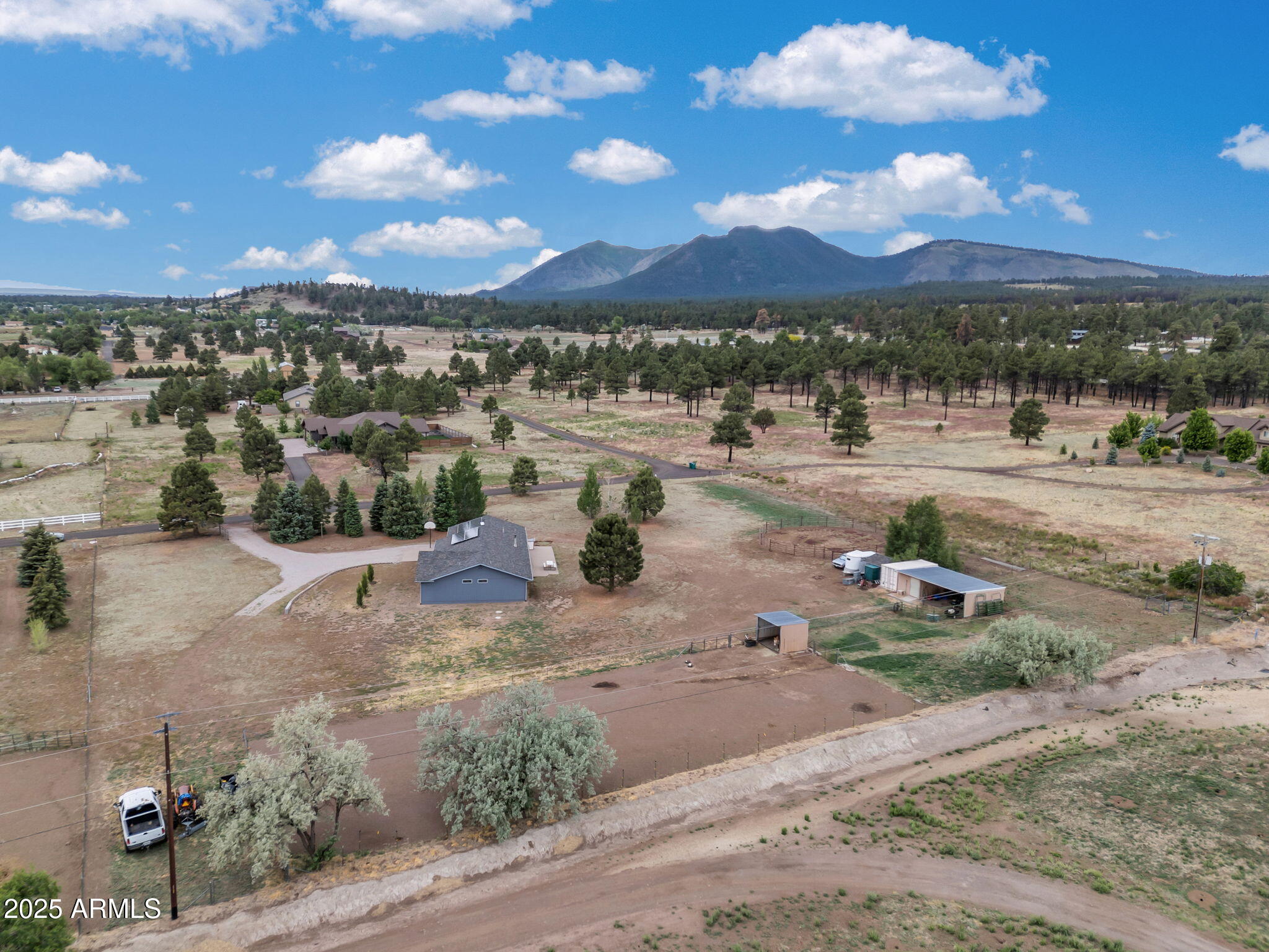 5545 East Atkinson Road Flagstaff, AZ 86004 - Photo 55 of 55 a view of a lake with a mountain