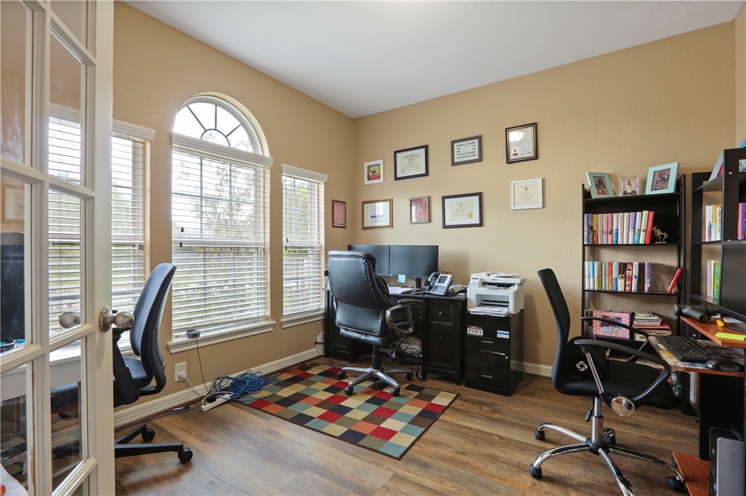 13423 Astley Acres Lane Cypress, TX 77429 - Photo 2 of 39 a view of a workspace with furniture and a window