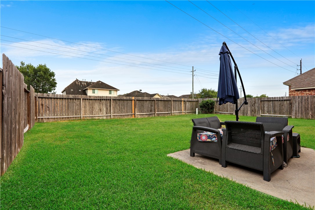 13423 Astley Acres Lane Cypress, TX 77429 - Photo 36 of 39 a view of a two chairs in the garden