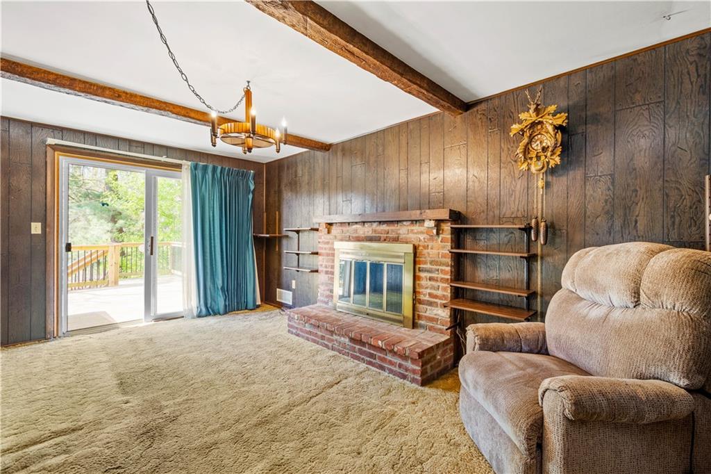 1709 Wilson Road Pittsburgh, PA 15236 - Photo 14 of 25 a bedroom with furniture and a chandelier