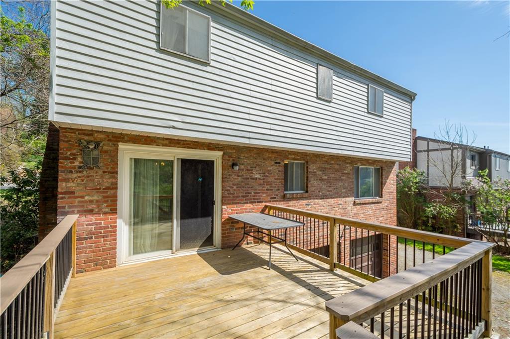 1709 Wilson Road Pittsburgh, PA 15236 - Photo 2 of 25 a view of a house with backyard and deck