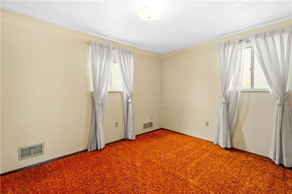 1709 Wilson Road Pittsburgh, PA 15236 - Photo 23 of 25 an empty room with a window