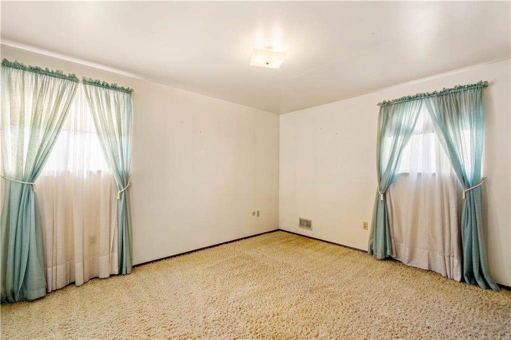 1709 Wilson Road Pittsburgh, PA 15236 - Photo 24 of 25 an empty room with windows