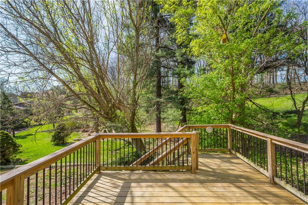 1709 Wilson Road Pittsburgh, PA 15236 - Photo 3 of 25 a view of a roof deck with wooden fence and floor