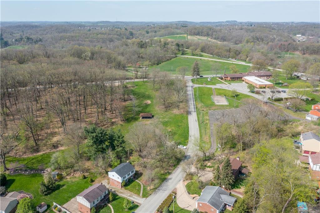 1709 Wilson Road Pittsburgh, PA 15236 - Photo 6 of 25 an aerial view of a house with a yard