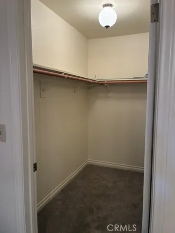 an empty room with a bench