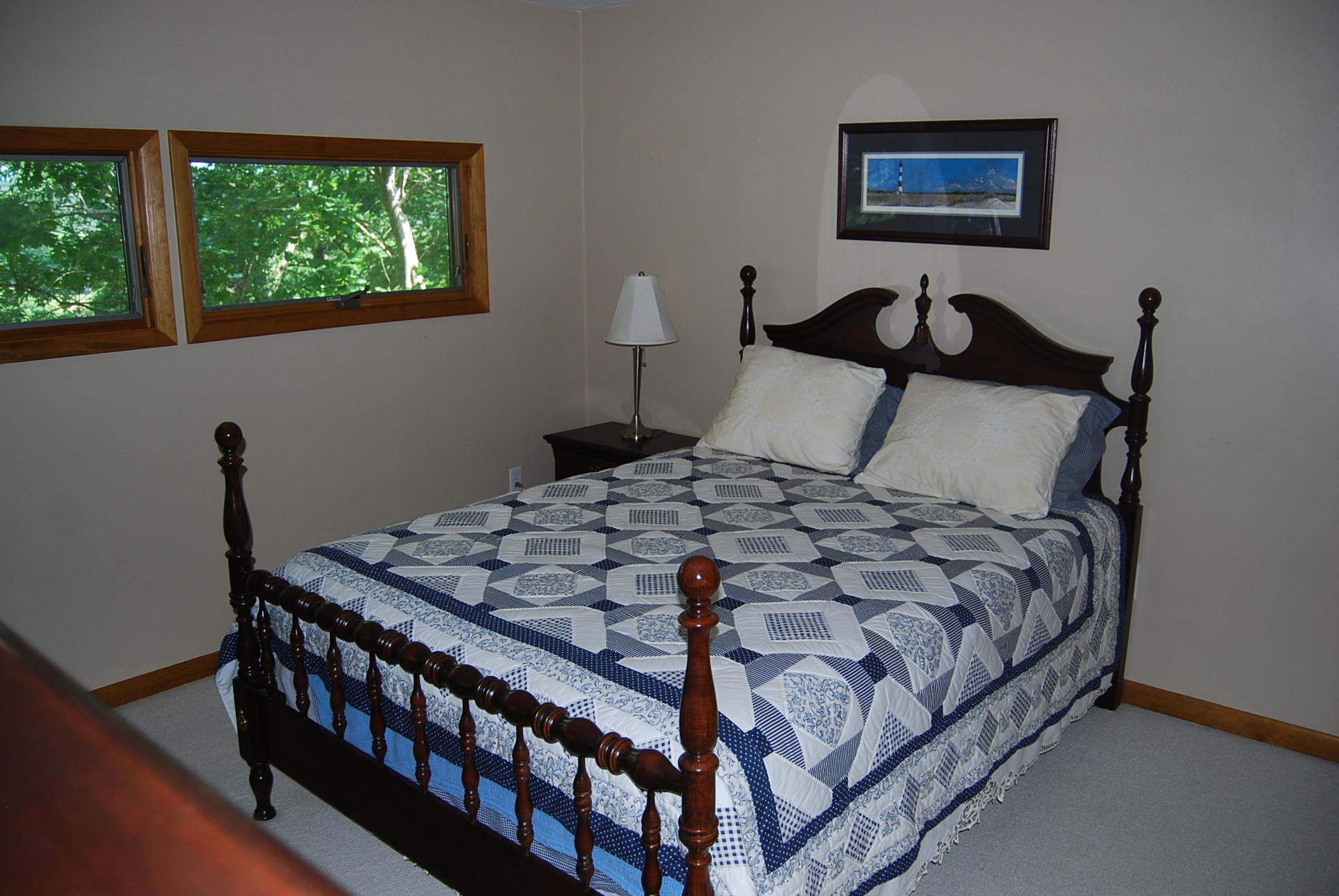 8045 Hardy Road Hardy, VA 24101 - Photo 27 of 63 a bedroom with a bed and a dresser next to a window