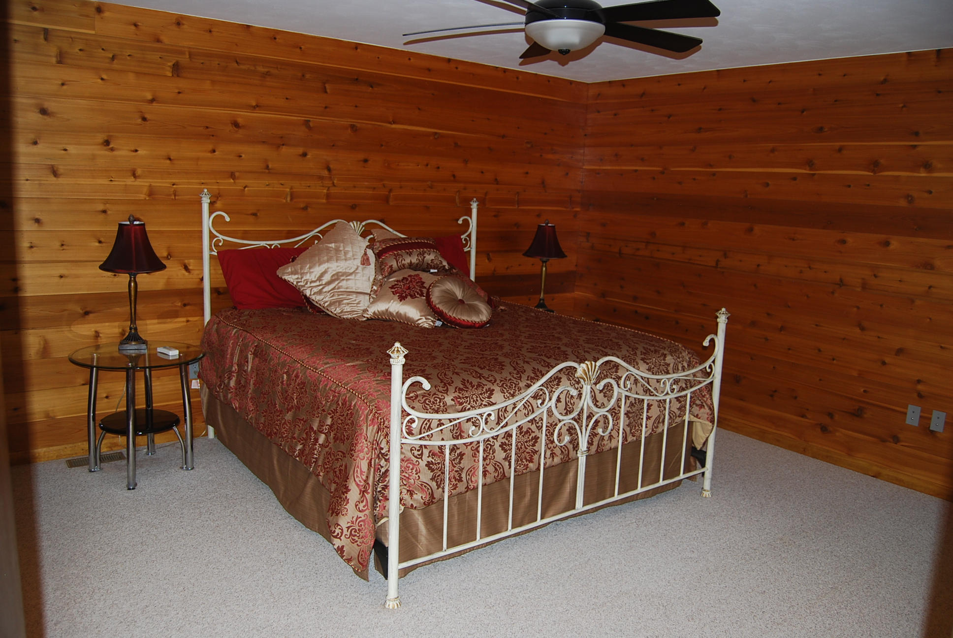 8045 Hardy Road Hardy, VA 24101 - Photo 28 of 63 a bedroom with a bed and a chandelier