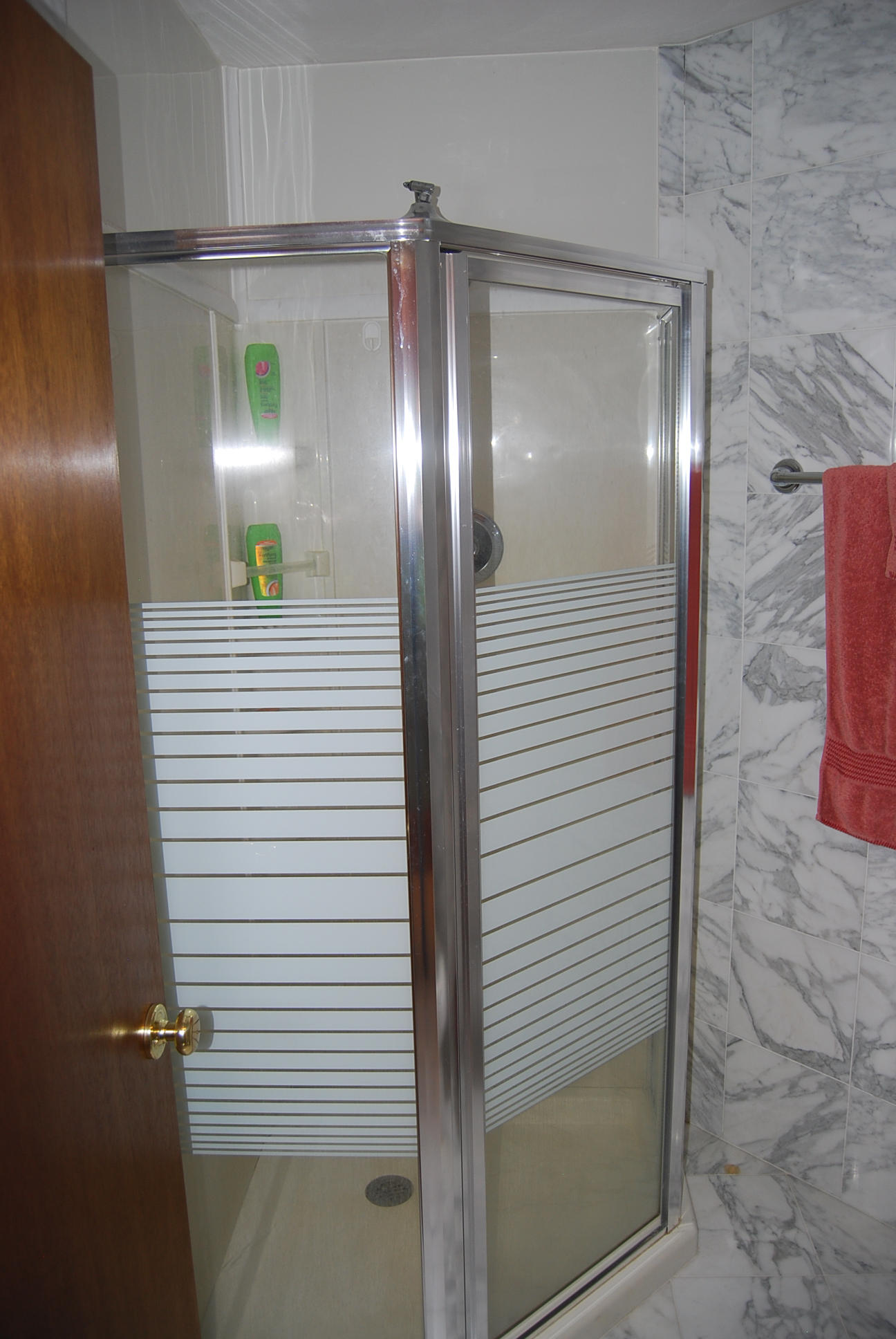 8045 Hardy Road Hardy, VA 24101 - Photo 32 of 63 a bathroom with a glass shower door