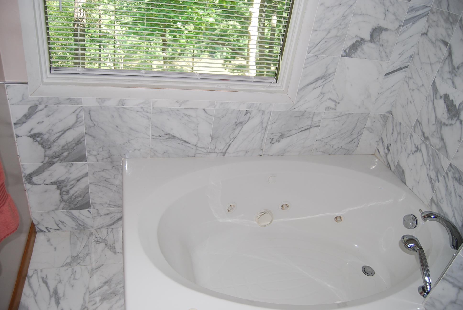 8045 Hardy Road Hardy, VA 24101 - Photo 35 of 63 a bath tub sitting in a bathroom next to a window