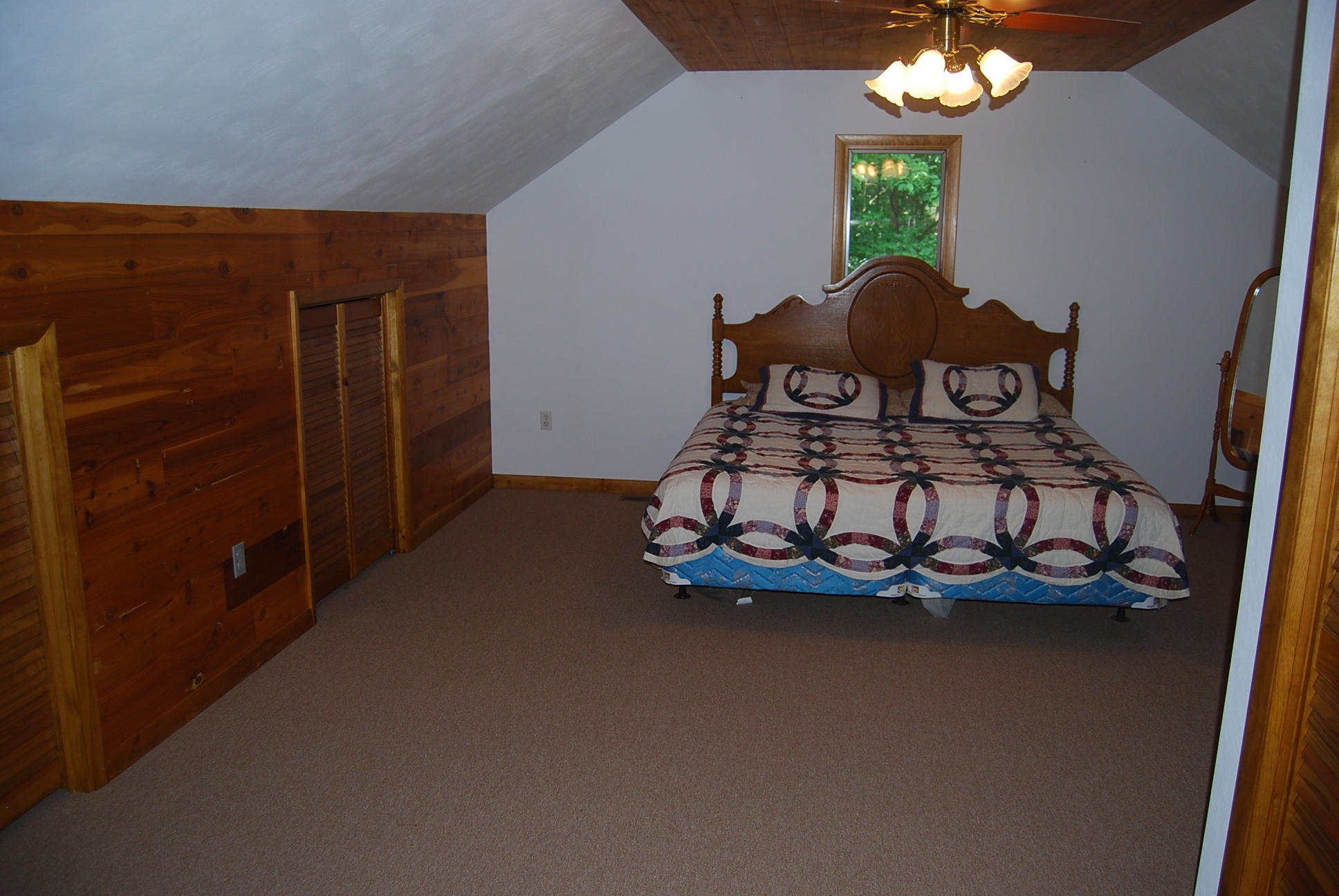 8045 Hardy Road Hardy, VA 24101 - Photo 38 of 63 a bed sitting in a room next to a window
