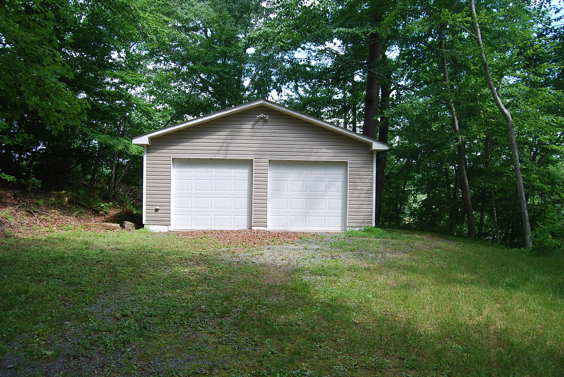 8045 Hardy Road Hardy, VA 24101 - Photo 46 of 63 a house is sitting in middle od the grass
