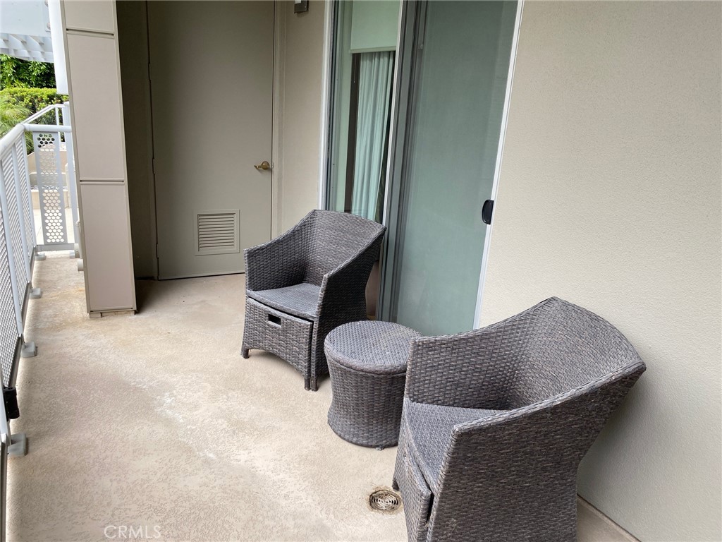 21 Gramercy, Unit 112 Irvine, CA 92612 - Photo 9 of 16 a living room with furniture and a window