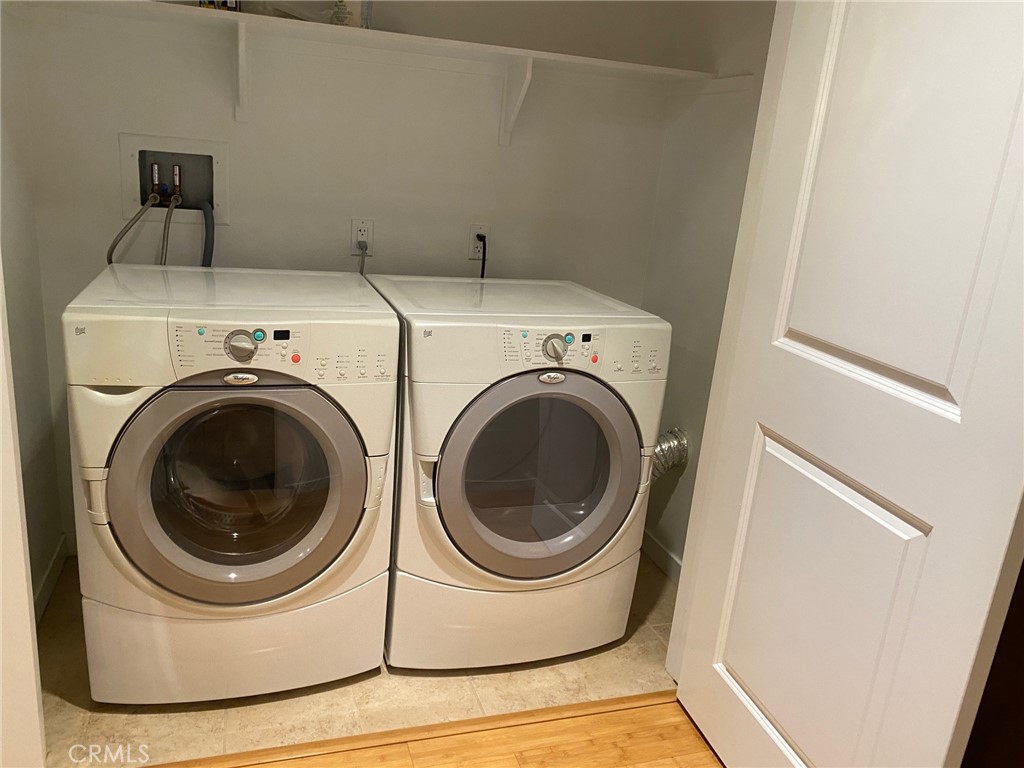 21 Gramercy, Unit 112 Irvine, CA 92612 - Photo 10 of 16 a utility room with dryer and washer