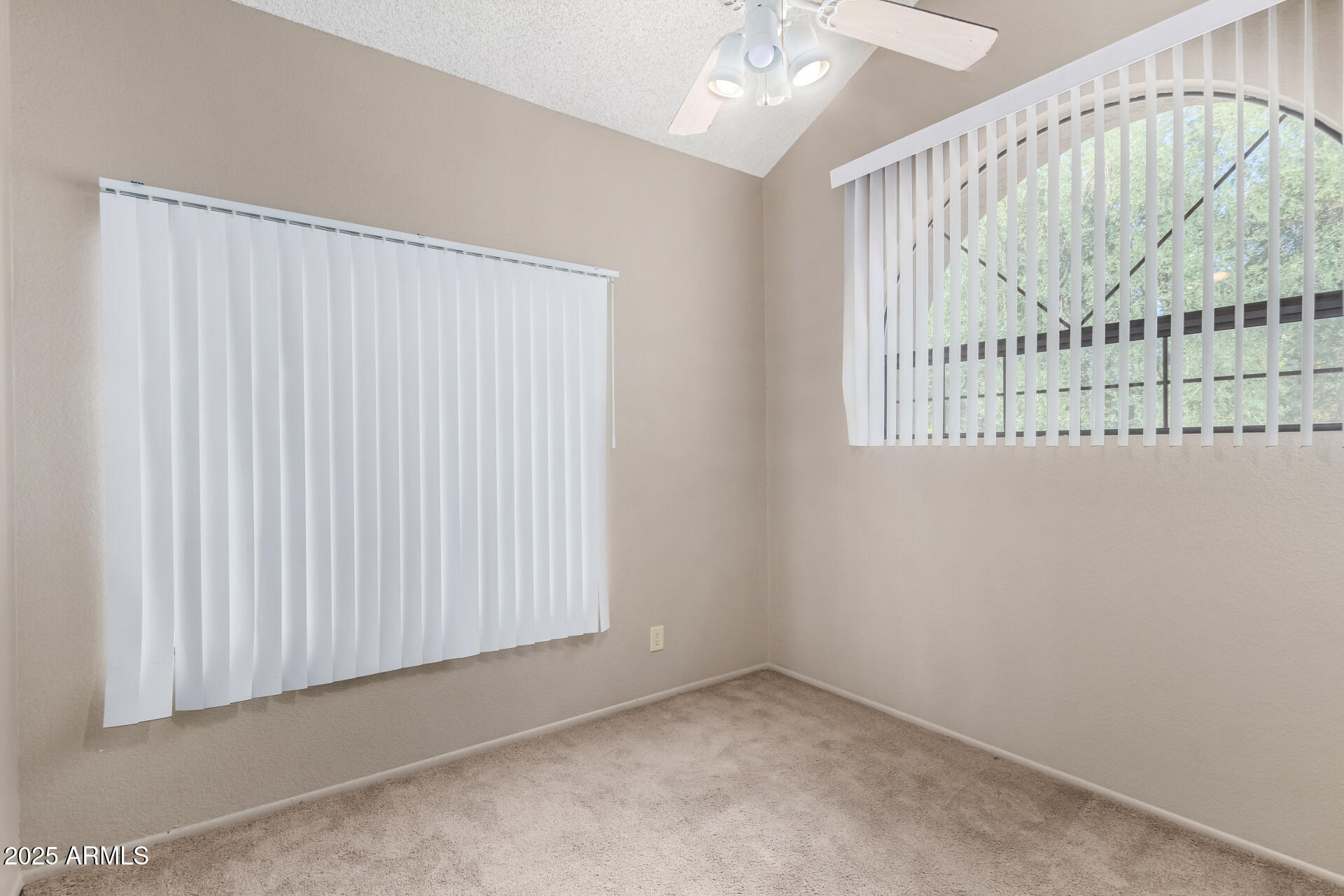 609 East Mesquite Circle, Unit D131 Tempe, AZ 85288 - Photo 19 of 39 an empty room with windows