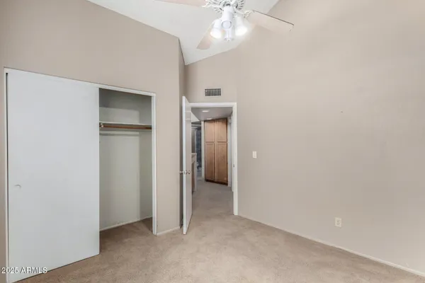 an empty room with a bathroom