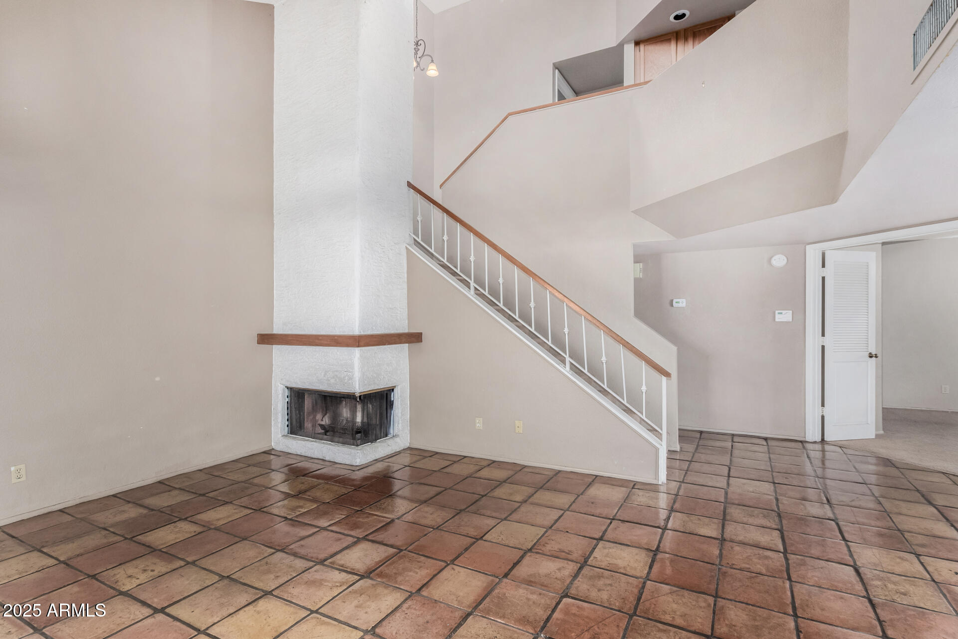609 East Mesquite Circle, Unit D131 Tempe, AZ 85288 - Photo 5 of 39 a view of an entryway with wooden floor