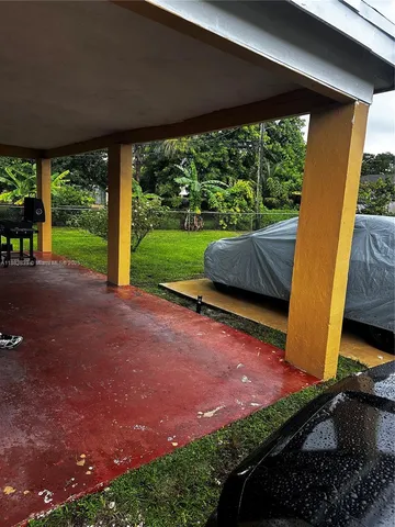 a view of backyard with green space