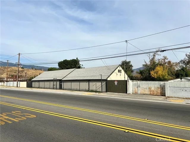 a view of a house with a street