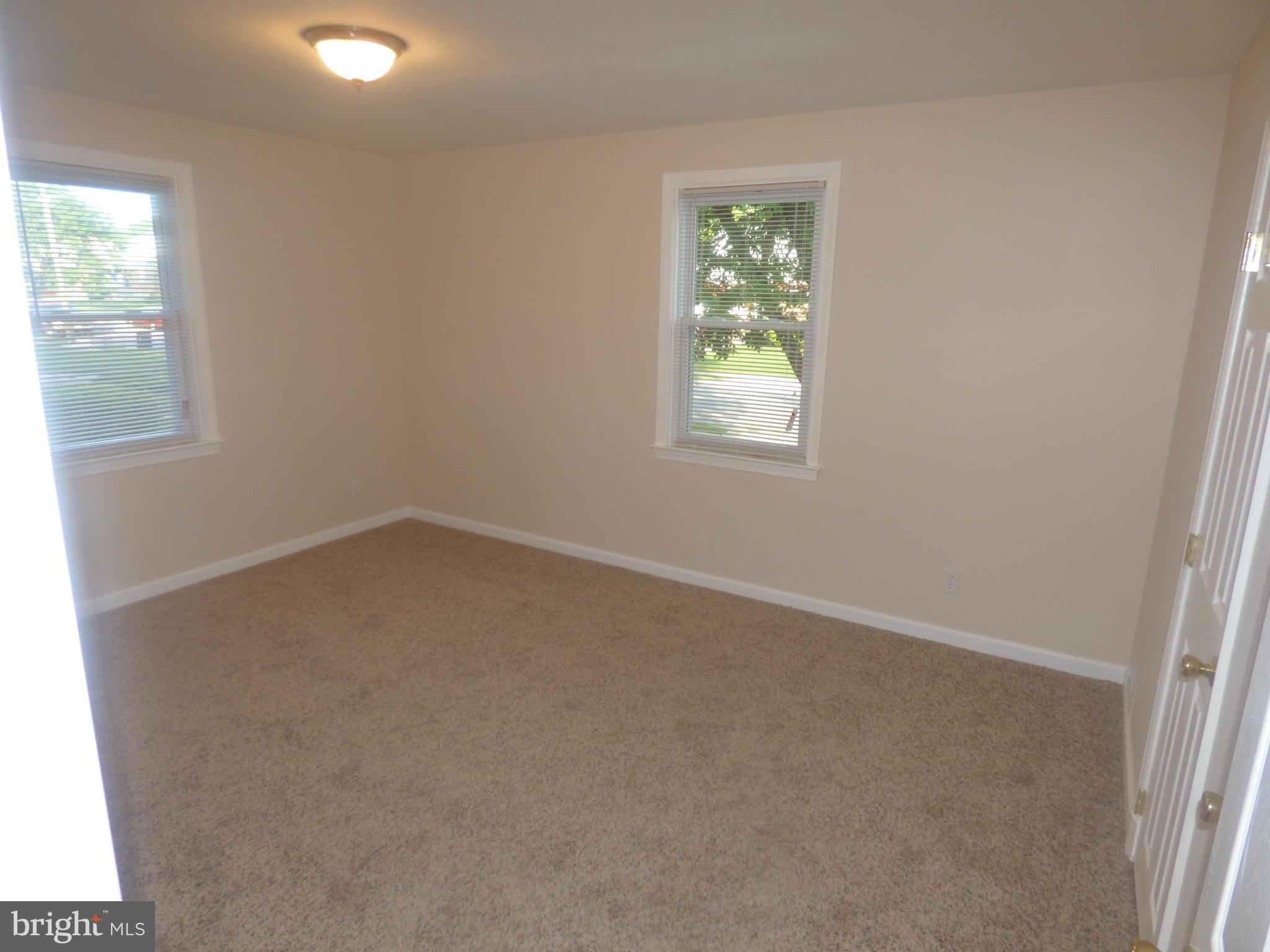 3405 Mayfair Road Baltimore, MD 21207 - Photo 13 of 27 an empty room with a window