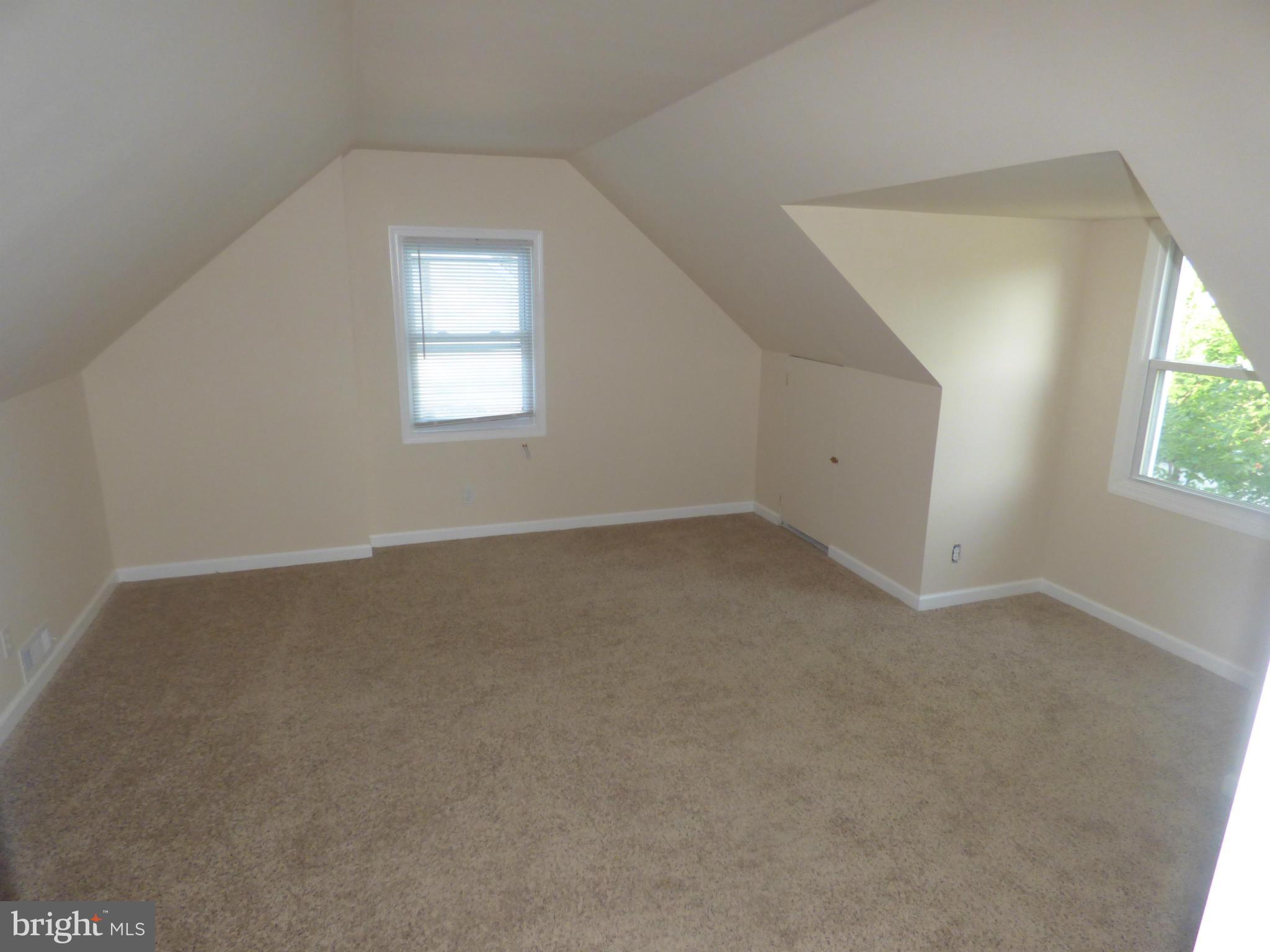 3405 Mayfair Road Baltimore, MD 21207 - Photo 15 of 27 an empty room with a window
