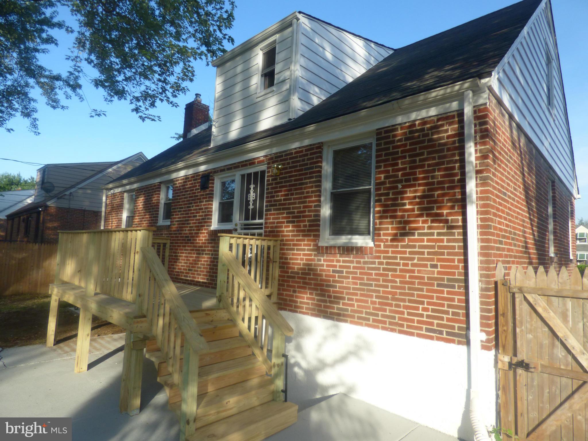 3405 Mayfair Road Baltimore, MD 21207 - Photo 27 of 27 a front view of a house with a yard