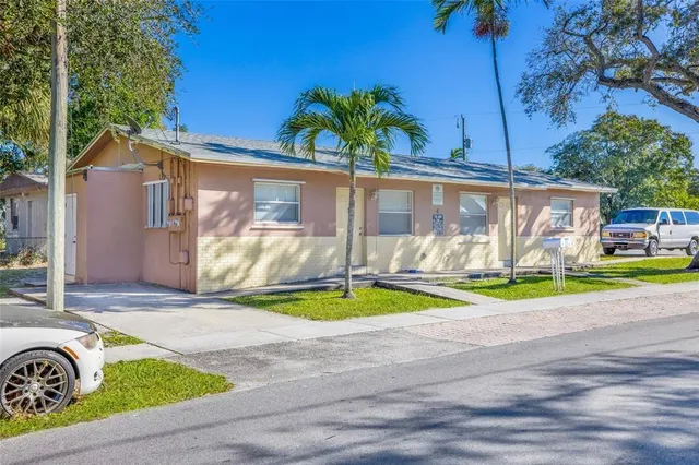 a view of a swimming pool with a backyard