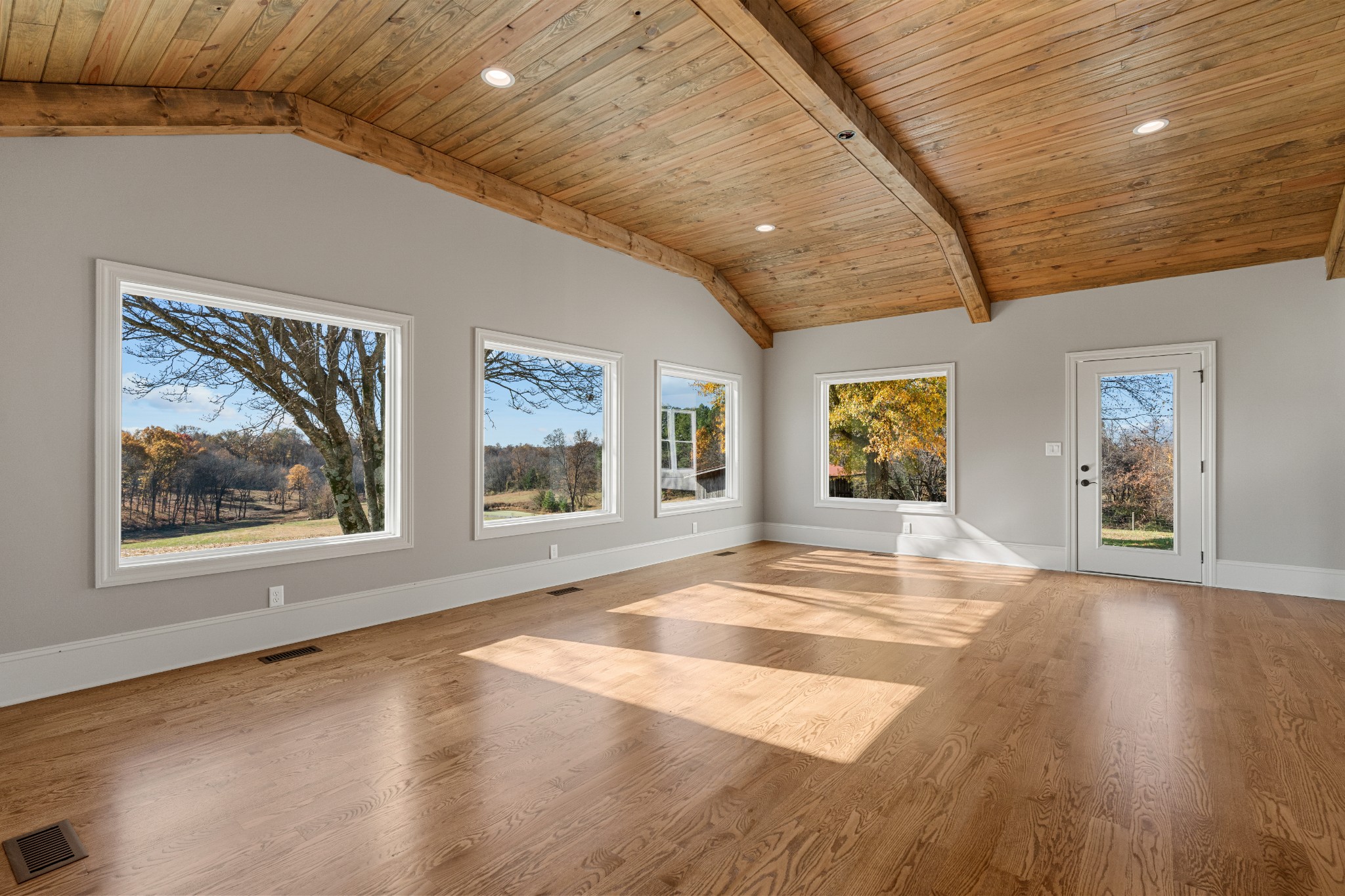 4818 Hickory Ridge Road Lebanon, TN 37087 - Photo 14 of 73 a view of an empty room with wooden floor and a window