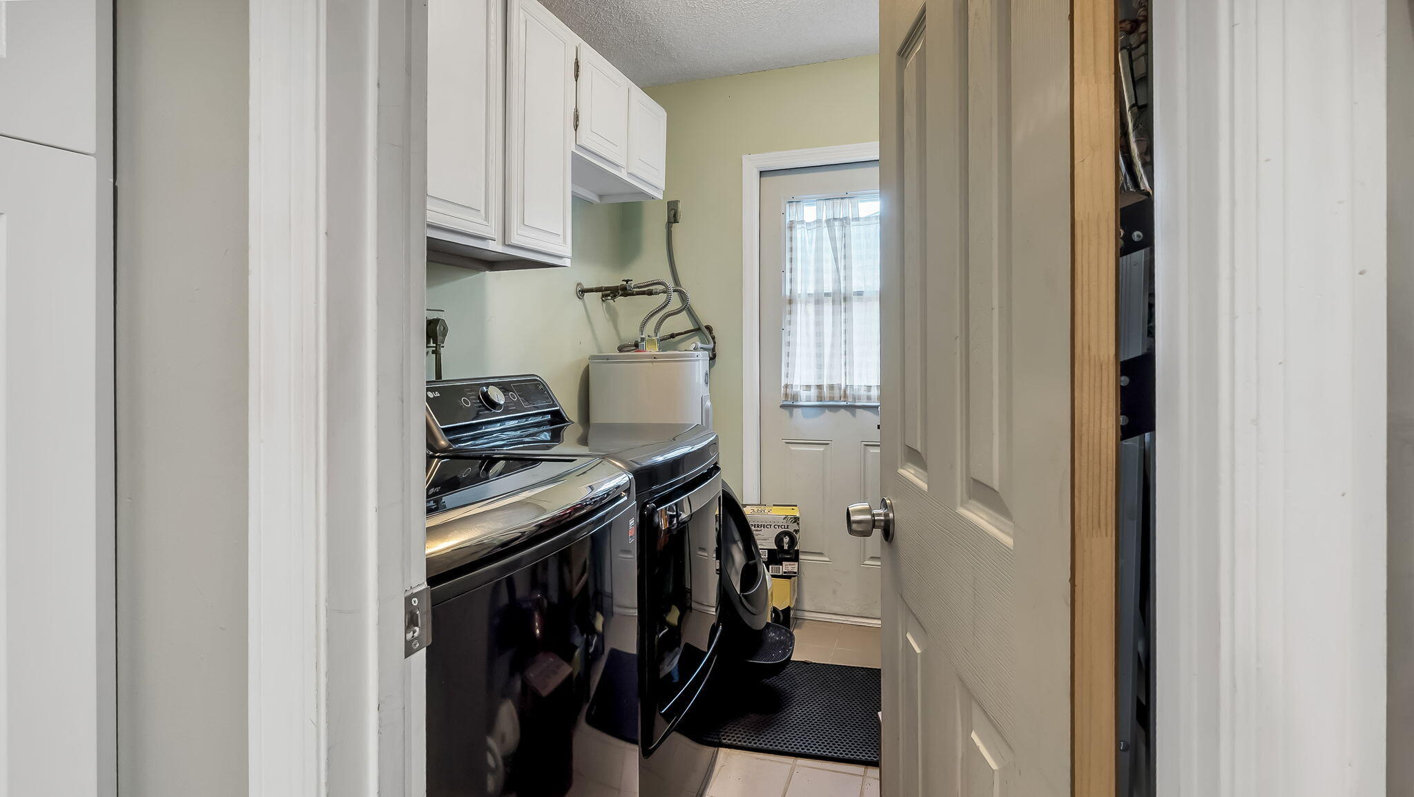 5298 2nd Road Lake Worth, FL 33467 - Photo 14 of 35 Laundry Room off the Kitchen.