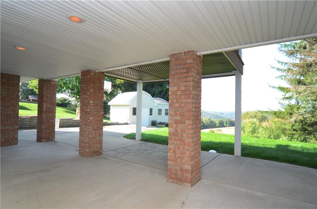 655 Bradys Ridge Road Beaver, PA 15009 - Photo 17 of 25 Enjoy an evening watching the sunset from large lower level patio.