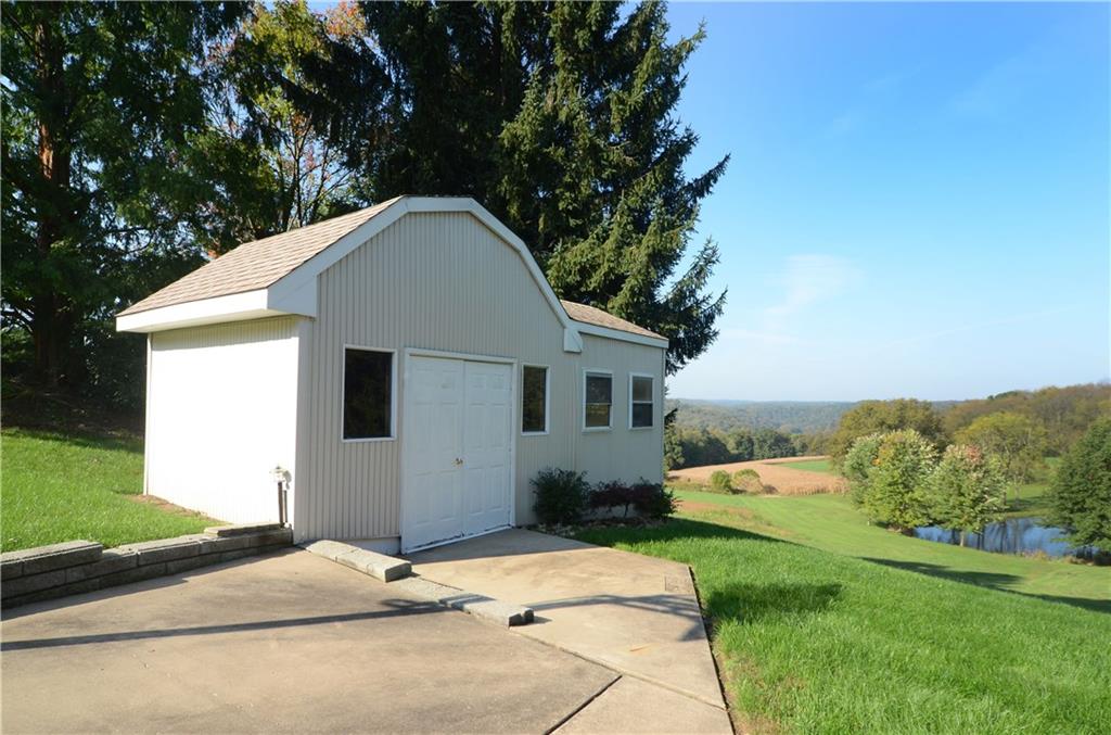 655 Bradys Ridge Road Beaver, PA 15009 - Photo 18 of 25 Take advantage of the extra large storage shed for your lawn tools.