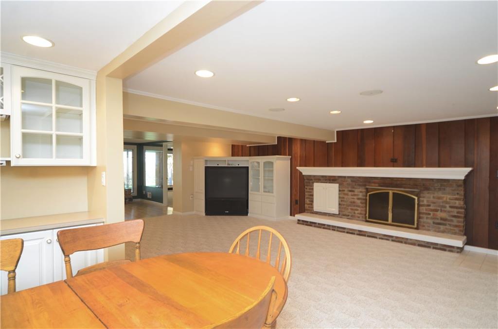 655 Bradys Ridge Road Beaver, PA 15009 - Photo 23 of 25 Entertain with ease next to the fire in the large 25x18 lower level family room.