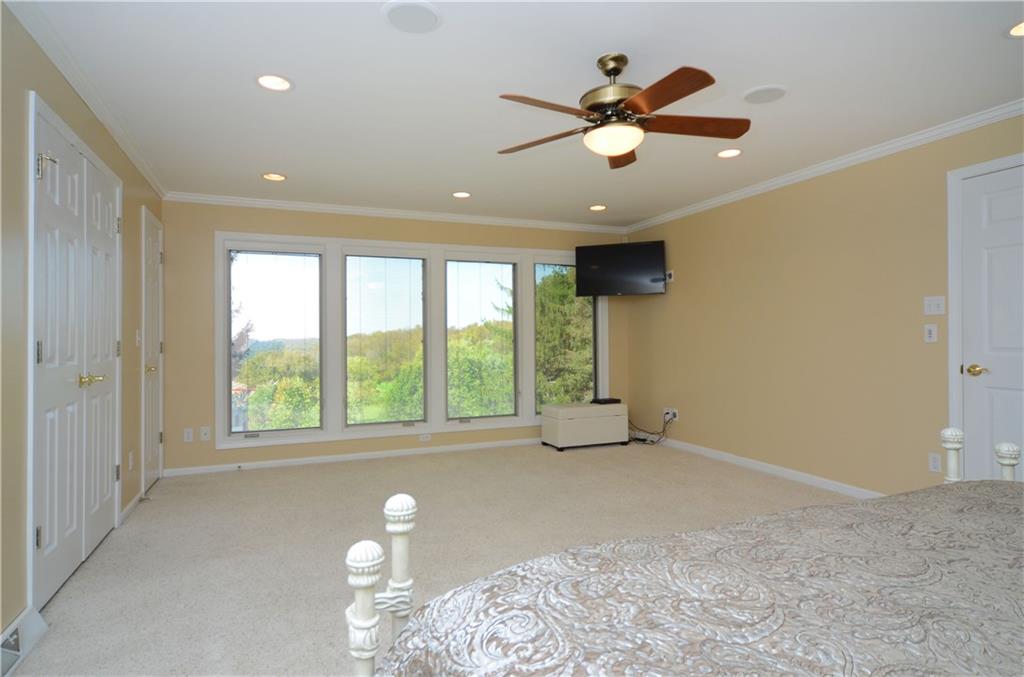 655 Bradys Ridge Road Beaver, PA 15009 - Photo 10 of 25 Wake up to a beautiful sunrise in the master bedroom suite. Enjoy tons of closet space that runs the length of the wall!