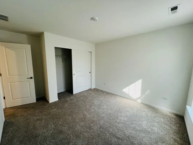 an empty room with closet