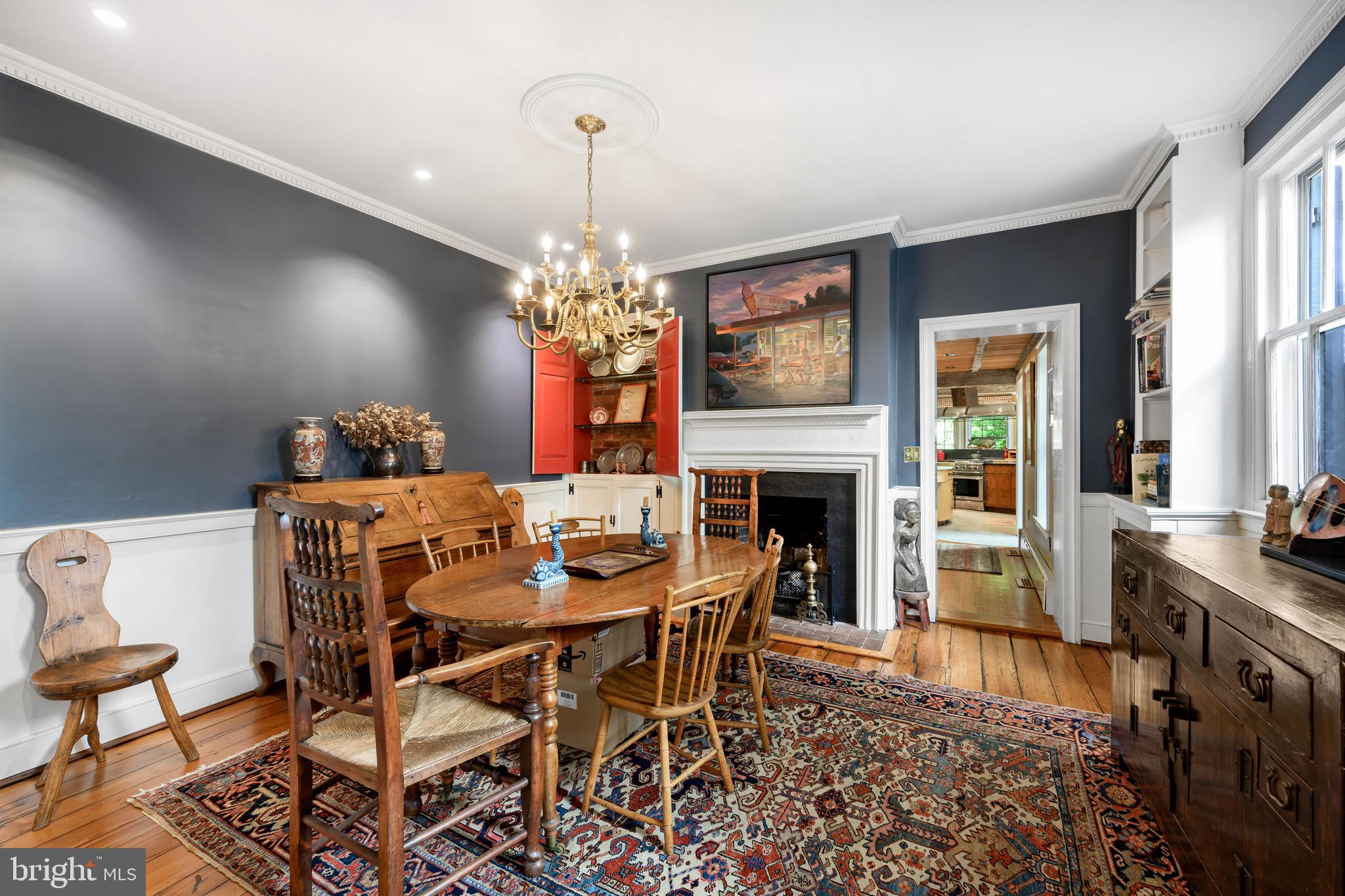 511 Queen Street Alexandria, VA 22314 - Photo 15 of 58 a view of a dining room with furniture and chandelier