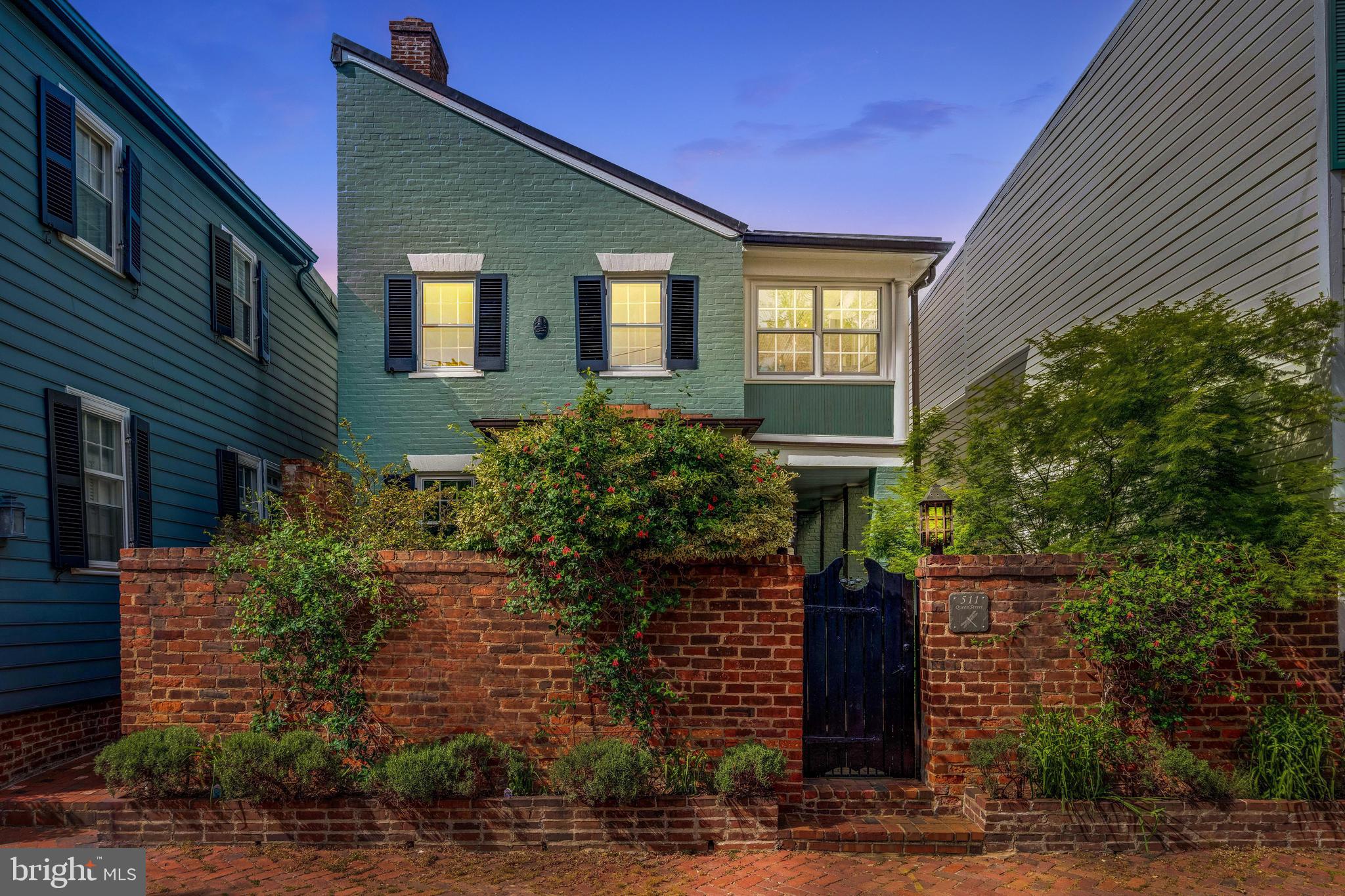 511 Queen Street Alexandria, VA 22314 - Photo 2 of 58 a front view of a house with plants