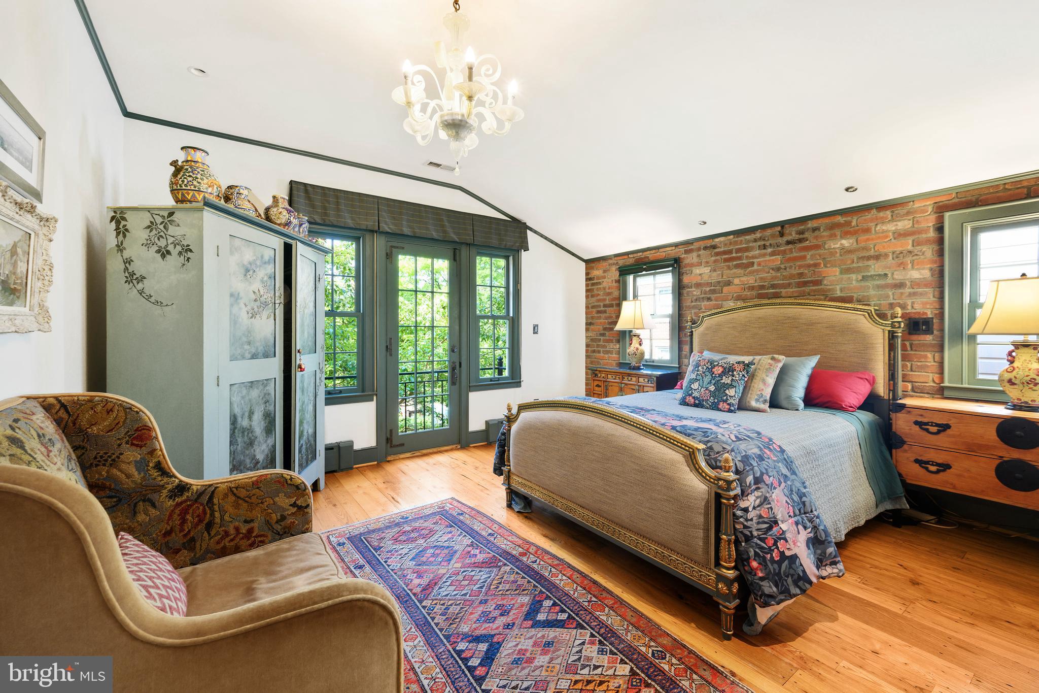511 Queen Street Alexandria, VA 22314 - Photo 28 of 58 a bed sitting in a bedroom next to a window