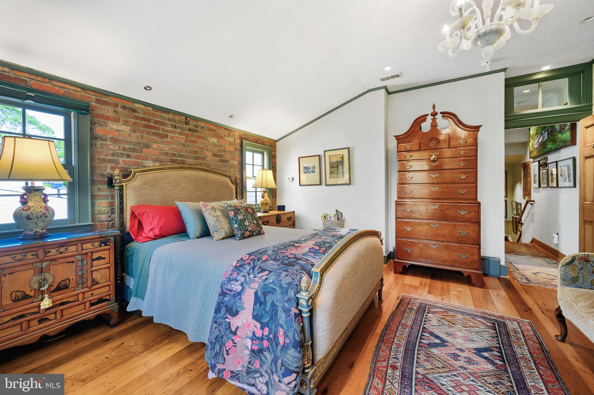 511 Queen Street Alexandria, VA 22314 - Photo 29 of 58 a bed room with a bed and a chair