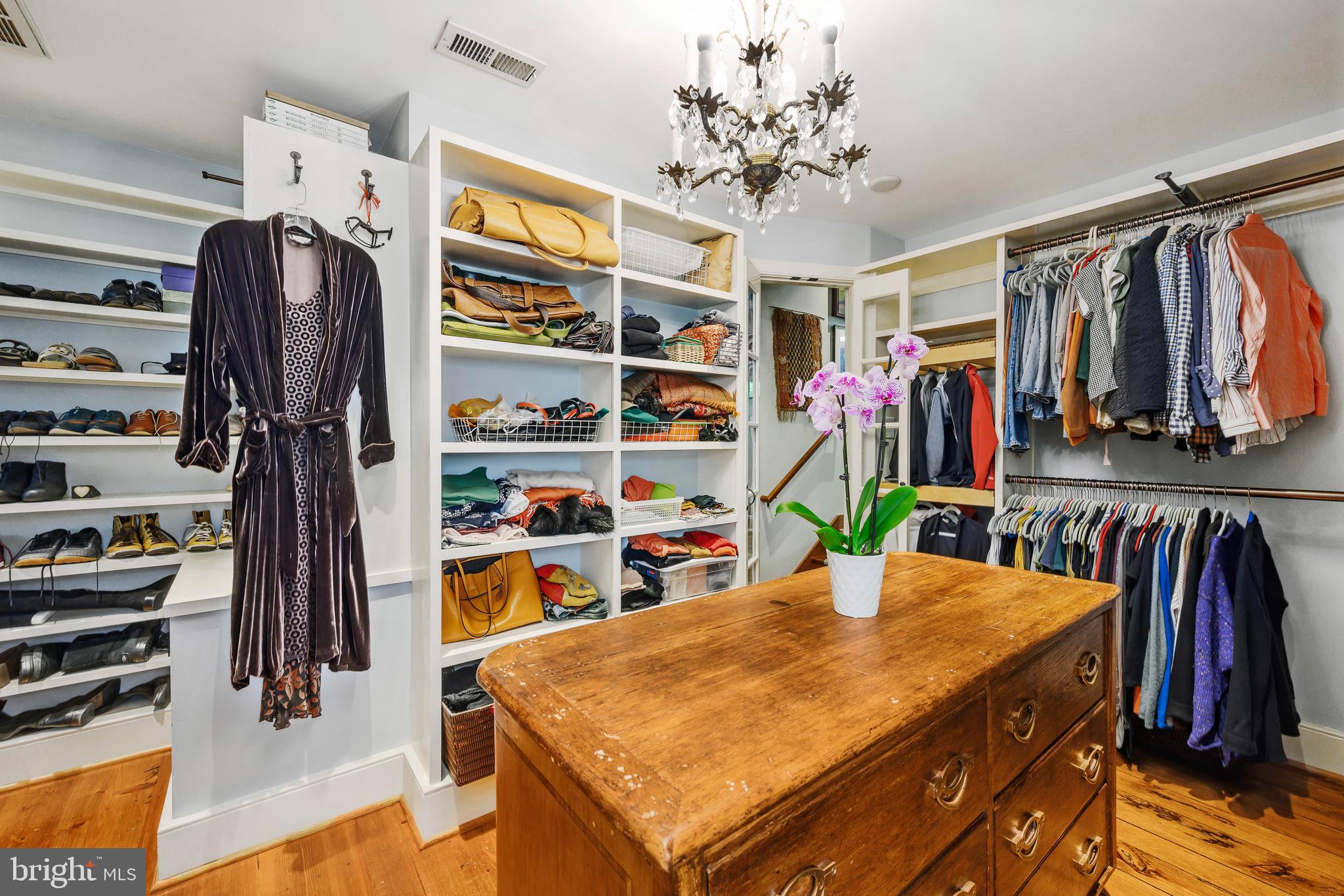 511 Queen Street Alexandria, VA 22314 - Photo 37 of 58 a view of walk in closet with clothes and shoes