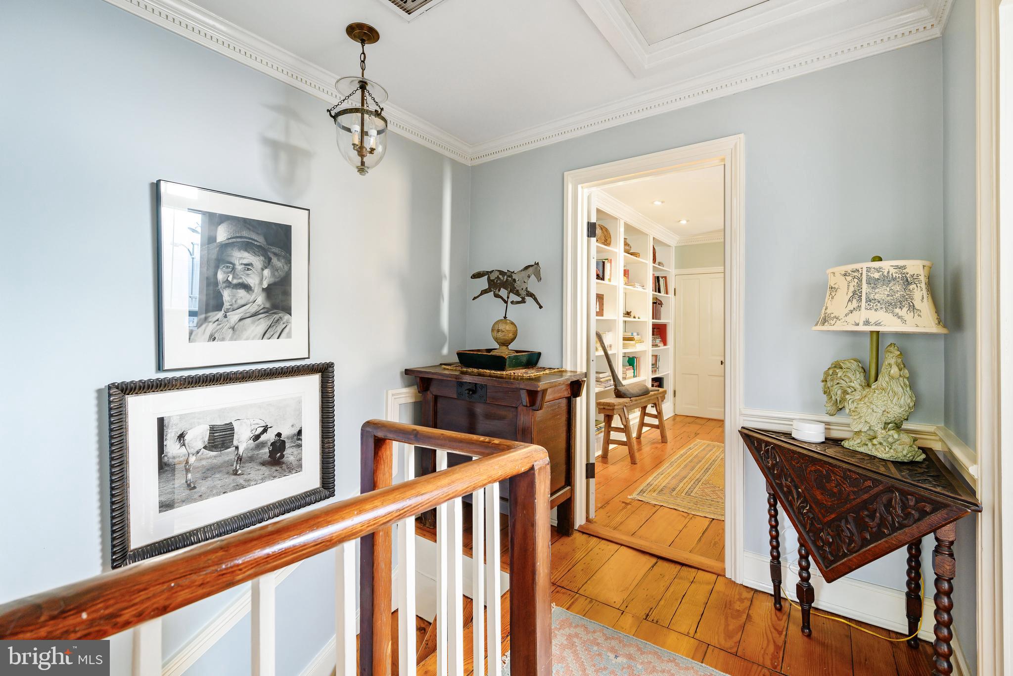 511 Queen Street Alexandria, VA 22314 - Photo 39 of 58 a living room with furniture and wooden floor