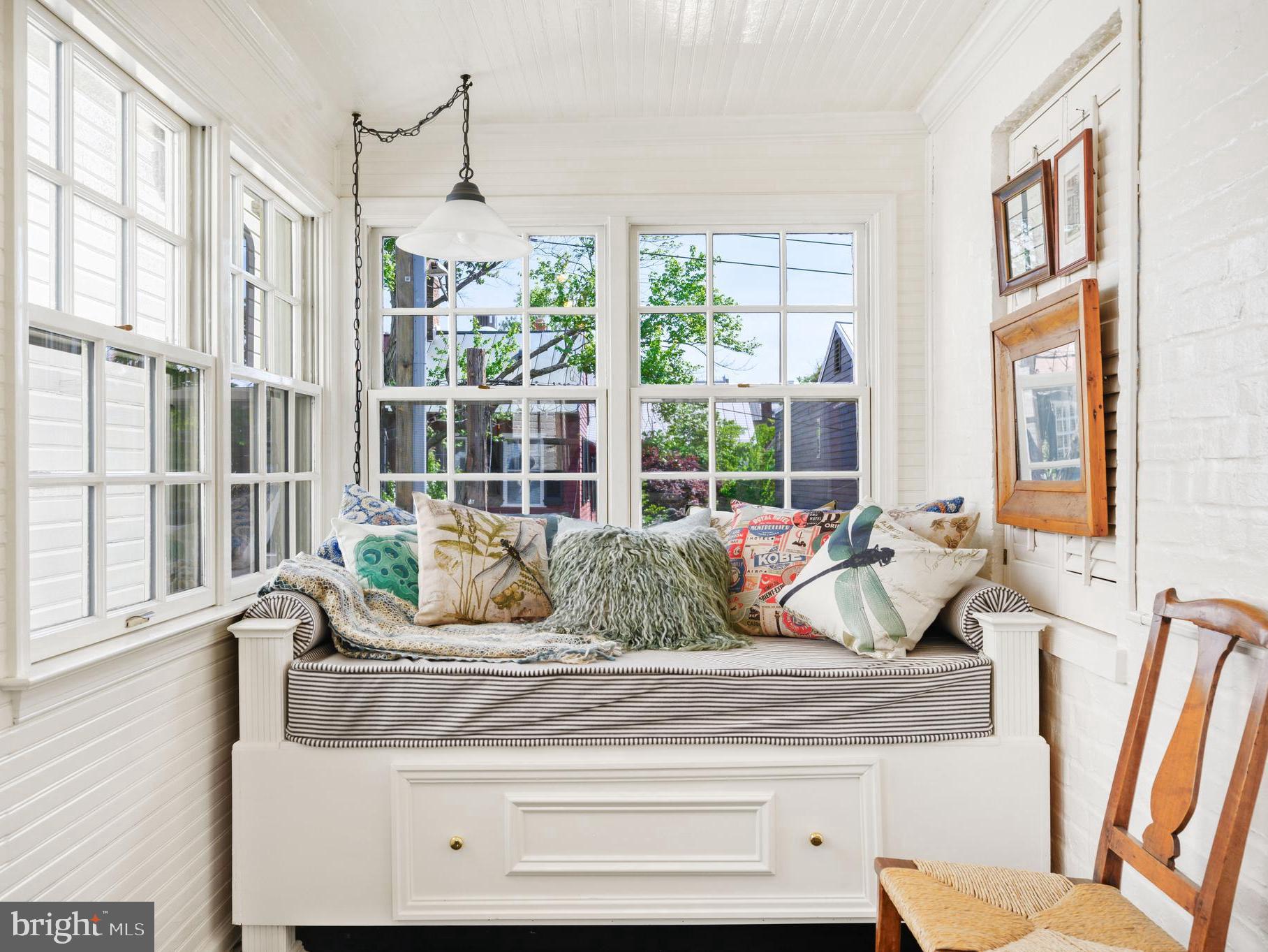 511 Queen Street Alexandria, VA 22314 - Photo 44 of 58 a living room with furniture and large windows