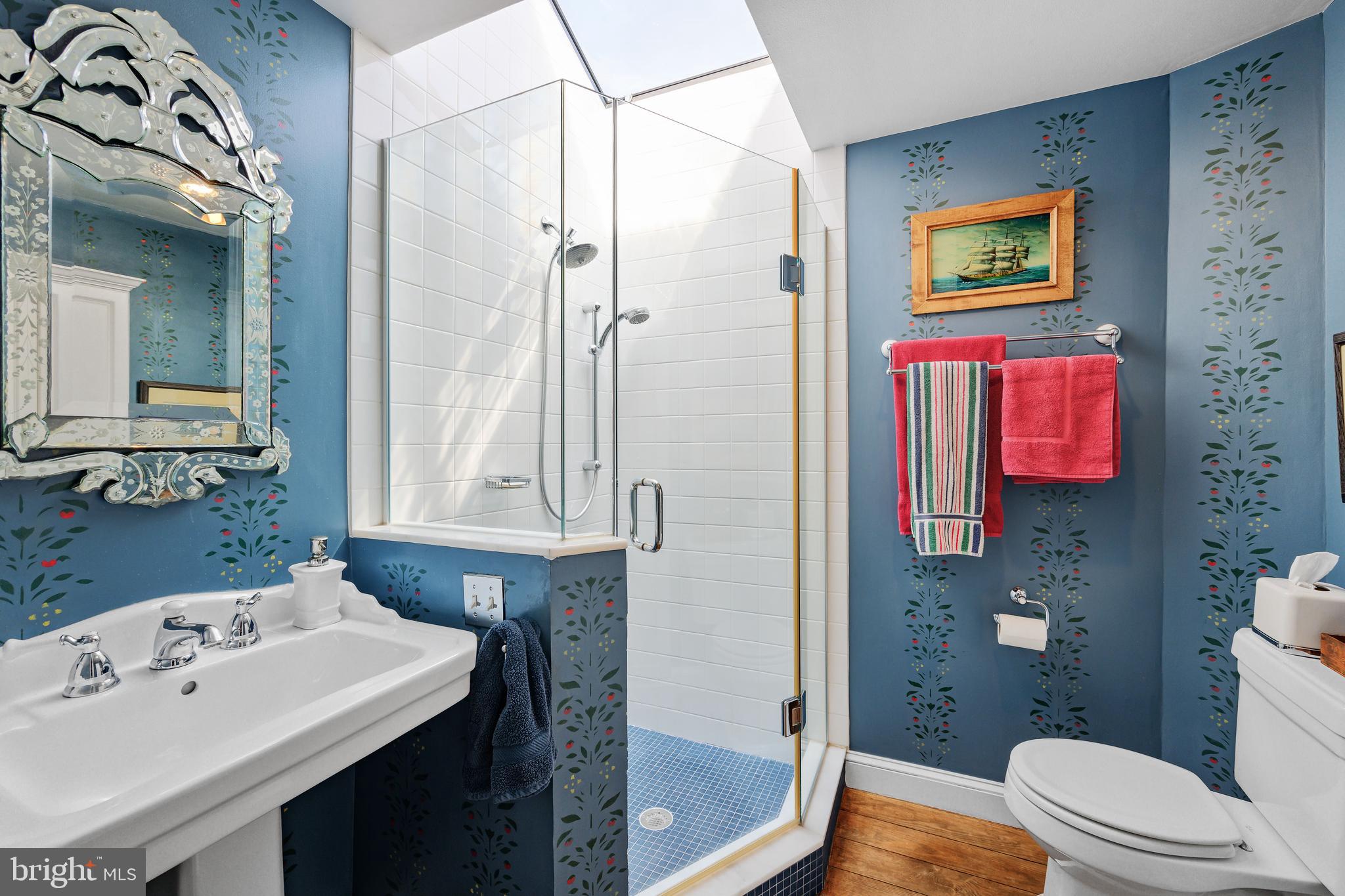 511 Queen Street Alexandria, VA 22314 - Photo 47 of 58 a bathroom with a sink a toilet and shower