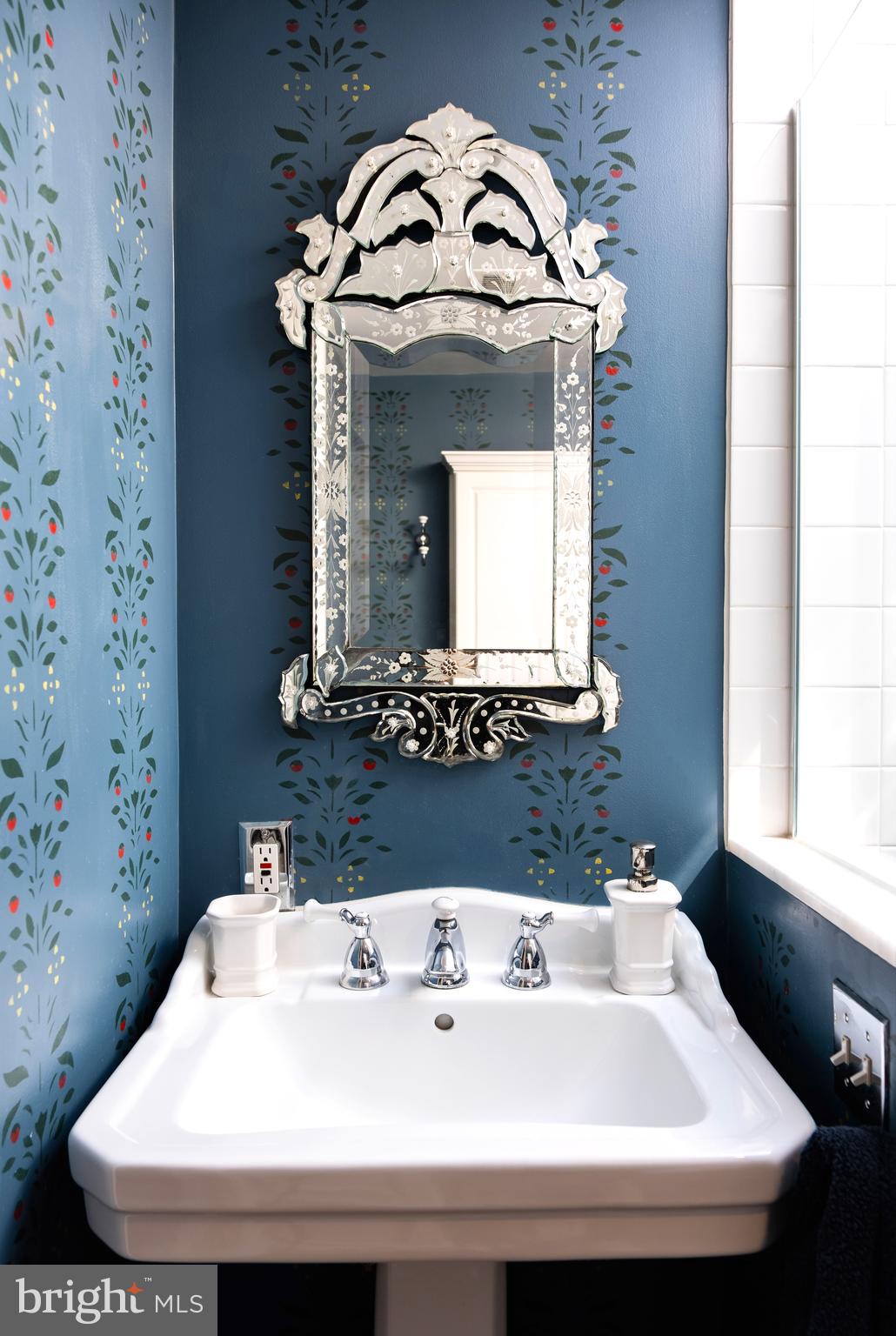 511 Queen Street Alexandria, VA 22314 - Photo 49 of 58 a bathroom with a sink and a mirror