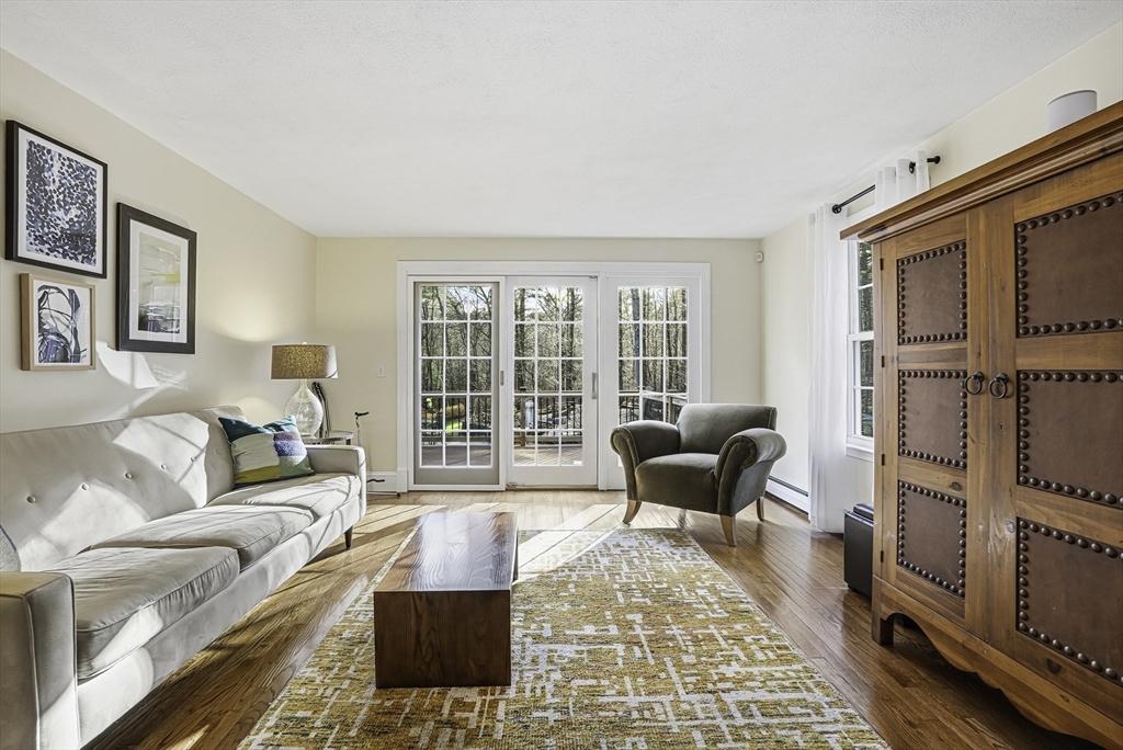 6 Hickory Lane Upton, MA 01568 - Photo 13 of 36 a living room with furniture and a rug