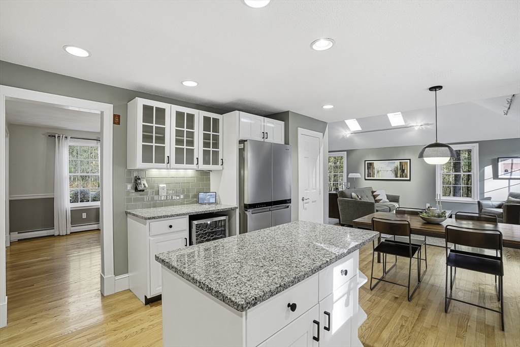 6 Hickory Lane Upton, MA 01568 - Photo 17 of 36 a kitchen with stainless steel appliances granite countertop a stove and a dining table