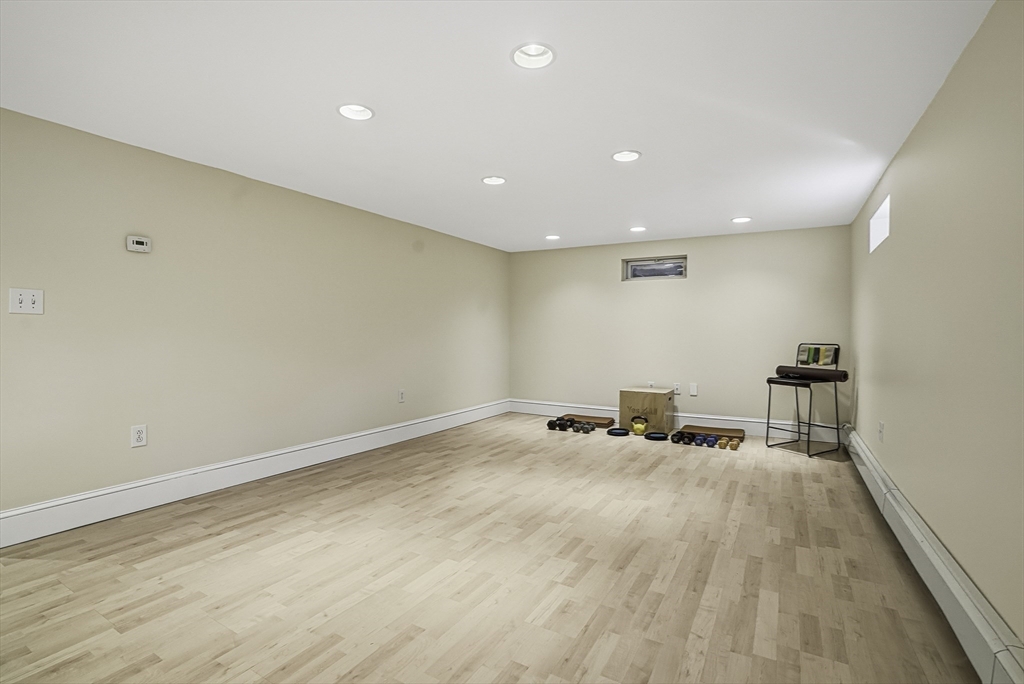 6 Hickory Lane Upton, MA 01568 - Photo 26 of 36 a view of a room with gym equipment